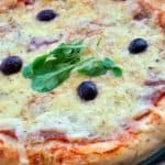 Homemade hand toss mozzarela pizza baked in oven at 500F profamilychef.com