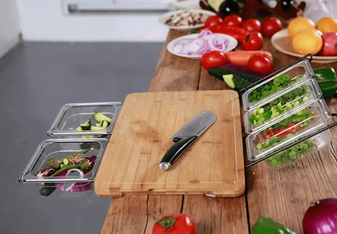 cutting board with containers and juice grove profamilychef.com