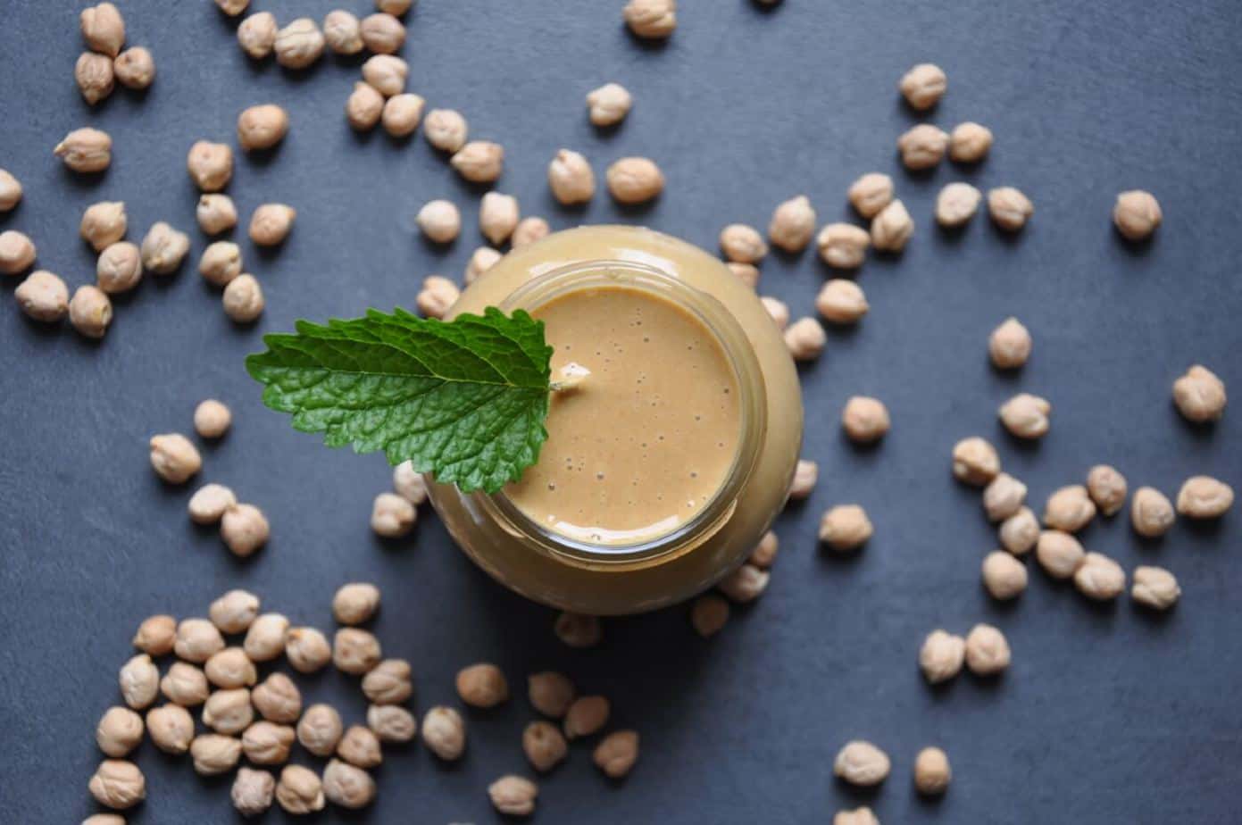 Is it cheaper to buy tahini homemade tahini paste with chickpeas in background