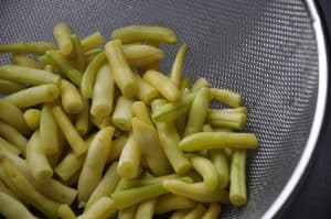 Drained yellow wax bean after they have been blanched