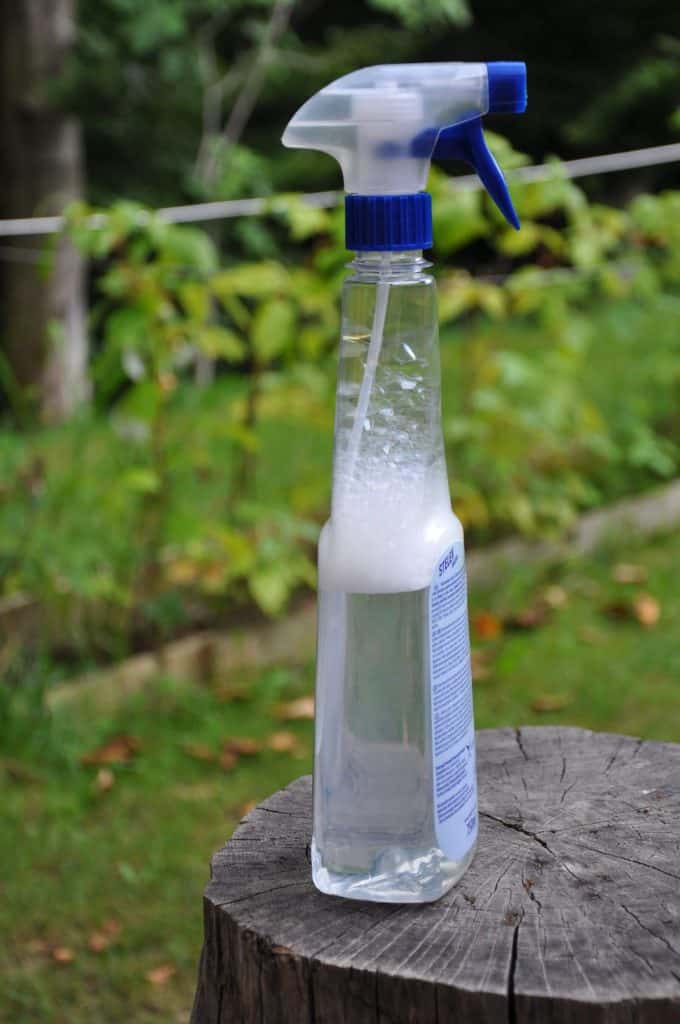 spray bottle with soup and water to check hose leakage