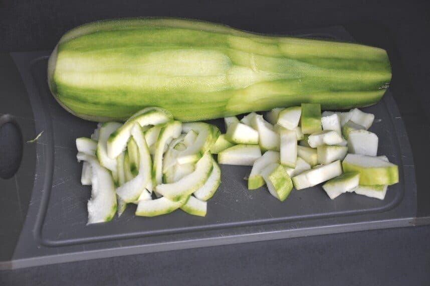 overgrown courgette or zucchini sliced and chopped into chunks