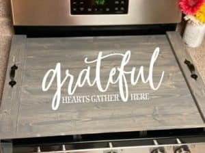 noodle board saying grateful hearts gather here