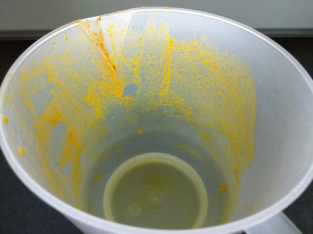 tumeric stains on plastic container