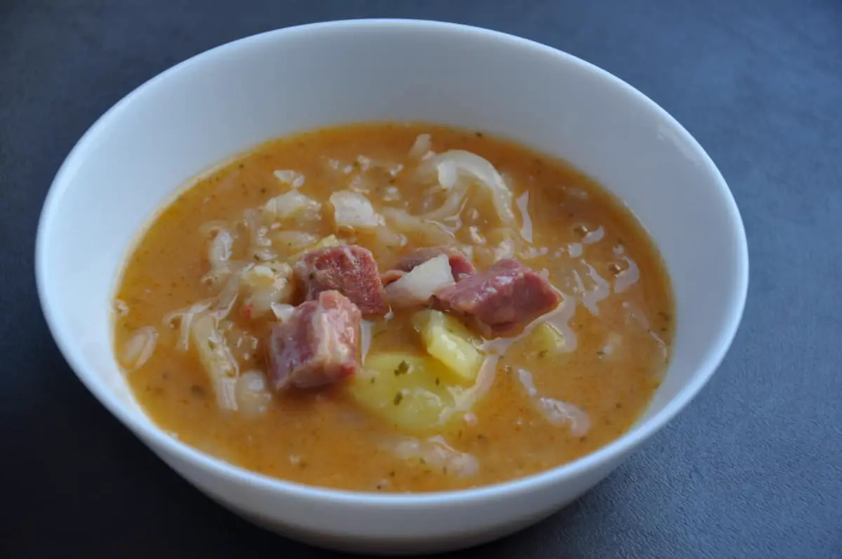 Fresh potatoe soup with ham for freezing