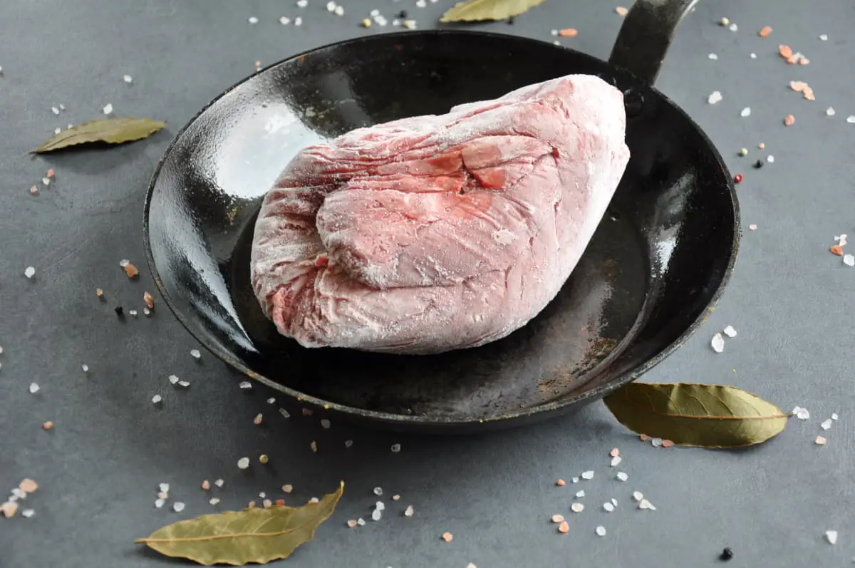 frozen beef ready to be cooked in a pan