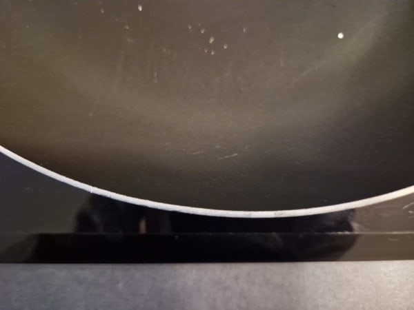 thin warped pan frying pan on induction cooktop