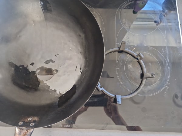 wok ring on glass stove